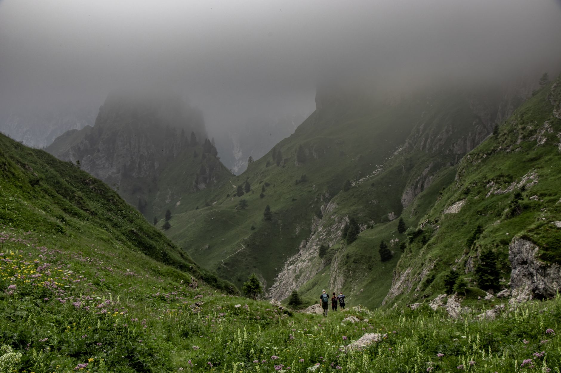 Dramatic view of the Italian Dolomites enveloped in morning mist